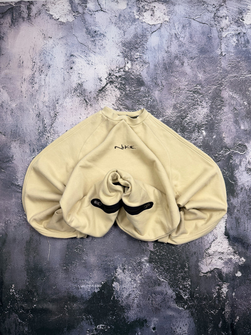 Bluza Nike kremowa z haftowanym logo i czarnymi zamkami przy dole – krój prosty – L — centralne