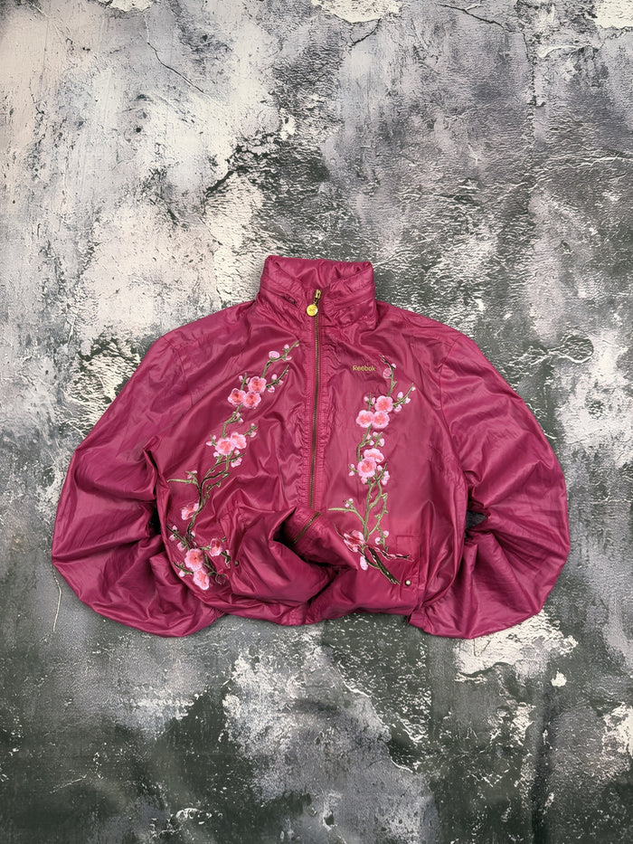 Kurtka Reebok różowa ze stójką i motywem sakury — Sakura